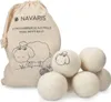 A bag of wool dryer balls with a sheep illustration and several wool dryer balls scattered in front of it. Produktbild-Vorschau