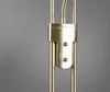 A close-up shot of the brass joint and flexible neck of a lamp. Anteprima dell’immagine prodotto