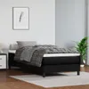 A bedroom scene with a black boxspring bed, bedding, and a nightstand. Náhled obrázku produktu
