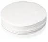 A stack of round white coffee filters. Produktbild-Vorschau