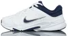 A side view of a white Nike shoe with navy blue accents. Voir les images du produit
