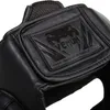 A close-up view of a black Venum boxing headguard. Produktbild-Vorschau