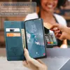 A person is using a phone case with card slots while making a payment. Produktbild-Vorschau