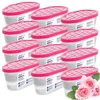 A collection of moisture absorbers with pink lids and a bouquet of pink roses. Voir les images du produit