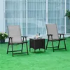 Two outdoor chairs and a small table are set up on a green lawn in front of a large window with sheer curtains. Produktbild-Vorschau