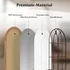 Diagram showing the layered materials of a mirror, with labels indicating 'MDF-Rückwand', 'Silberbeschichtung', 'Premium-Glas', and 'Metallrahmen'. Náhľad obrázku produktu