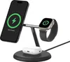 A black wireless charging stand with a phone and smartwatch attached, and a pair of earbuds on the base. Produktbild-Vorschau