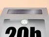 A close-up view of a solar-powered house number light with the number '20h' displayed. Produktbild-Vorschau