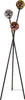 A floor lamp with three spherical glass shades of different colors and finishes, supported by a black tripod base. Produktbild-Vorschau