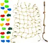 A set of climbing accessories including climbing holds, a climbing net, and a climbing rope, laid out on a white background. Podgląd zdjęcia produktu