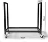 A black metal firewood rack with wheels, shown against a white background, with dimensions indicated by text overlays. Produktbild-Vorschau