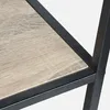 A close-up view of a shelf with a wood-look surface and a black metal frame. Produktbild-Vorschau