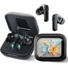 A set of black wireless earbuds with their charging case and a separate small screen device, arranged on a white background. Produktbild-Vorschau