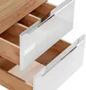 A close-up view of two open drawers of a cabinet, showing the wooden interior and white glossy fronts with silver handles. Produktbild-Vorschau