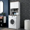 A modern bathroom with a washing machine and storage unit. Voir les images du produit