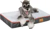 A Schnauzer dog lying on a dog bed. Náhled obrázku produktu