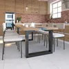 A modern kitchen with a dining table and chairs. Produktbild-Vorschau