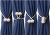 Four different ways to use magnetic curtain tie-backs on blue curtains. Náhľad obrázku produktu