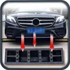 A car is shown parked over a parking curb, with red arrows indicating the direction of movement. Produktbild-Vorschau