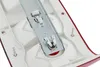 Close-up view of the internal components of a vehicle's taillight assembly, showing bulb sockets and mounting hardware. Anteprima dell’immagine prodotto