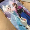 A close-up view of a Disney Frozen themed duvet cover and pillowcase set, laid out on a bed. Produktbild-Vorschau