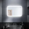 A lit bathroom mirror mounted on a tiled wall, with icons and text below describing its features. Náhled obrázku produktu