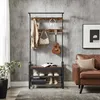 A hallway or entryway scene with a coat rack and shoe storage unit. Produktbild-Vorschau