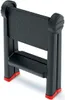 A black and red step stool is shown against a white background. Náhľad obrázku produktu
