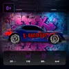 A blue remote-controlled drift car with red flame graphics, set against a graffiti-covered wall. Produktbild-Vorschau