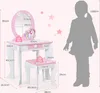 A child's dressing table and stool set with a silhouette of a child for scale, with dimensions indicated by measurement lines and text. Produktbild-Vorschau