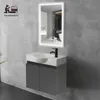 A modern bathroom vanity with a sink and mirror mounted on a concrete wall. Produktbild-Vorschau