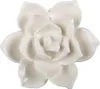 A close-up studio shot of a decorative ceramic flower. Produktbild-Vorschau