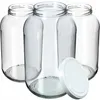 Three clear glass jars with one white lid in the foreground. Podgląd zdjęcia produktu