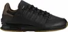 A side view of a black K-Swiss sneaker with brown accents. Podgląd zdjęcia produktu