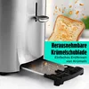 A close-up view of a stainless steel toaster with its crumb tray extended and filled with crumbs, alongside a slice of toast. Anteprima dell’immagine prodotto