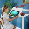 A young girl is drawing on a tablet that is mounted on a mobile desk. Voir les images du produit