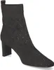 A black knitted boot with a geometric pattern and rhinestones. Produktbild-Vorschau