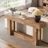 A console table with decorative items placed on it, situated in a living room setting. Produktbild-Vorschau