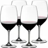 Four wine glasses filled with red wine, arranged in a group against a white background. Produktbild-Vorschau