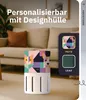 A personalized air purifier with a decorative sleeve featuring pet designs, placed in a living room setting. Produktbild-Vorschau