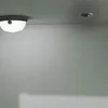 Two ceiling lights are shown on a light gray ceiling. Produktbild-Vorschau