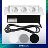 A product shot of a retractable power strip with three outlets, a power cord, and three color swatches (white, gray, black) below. The product is shown from a slightly elevated front-facing angle. Produktbild-Vorschau