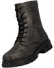 Auf dem Bild ist ein bronzefarbener Stiefel zu sehen der von der Seite betrachtet wird. Der Stiefel hat einen hohen Schaft und eine strukturierte Oberfläche die ihm ein elegantes Aussehen verleiht. Produktbild-Vorschau