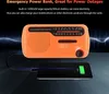 An orange emergency radio is shown charging a smartphone. Voir les images du produit