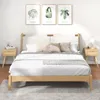 A bedroom scene with a bed, nightstands, and artwork on the wall. Produktbild-Vorschau