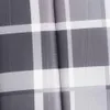 A close-up view of a gray and white checkered fabric. Produktbild-Vorschau