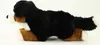 A plush toy dog lying down, viewed from the side. Produktbild-Vorschau