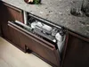A dishwasher with its door open, showing the interior filled with dishes, set in a modern kitchen. Anteprima dell’immagine prodotto