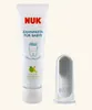 A tube of baby toothpaste and a finger toothbrush are displayed against a light gray background. Anteprima dell’immagine prodotto