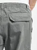 Close-up of the back pocket of gray cargo jogging pants. Produktbild-Vorschau